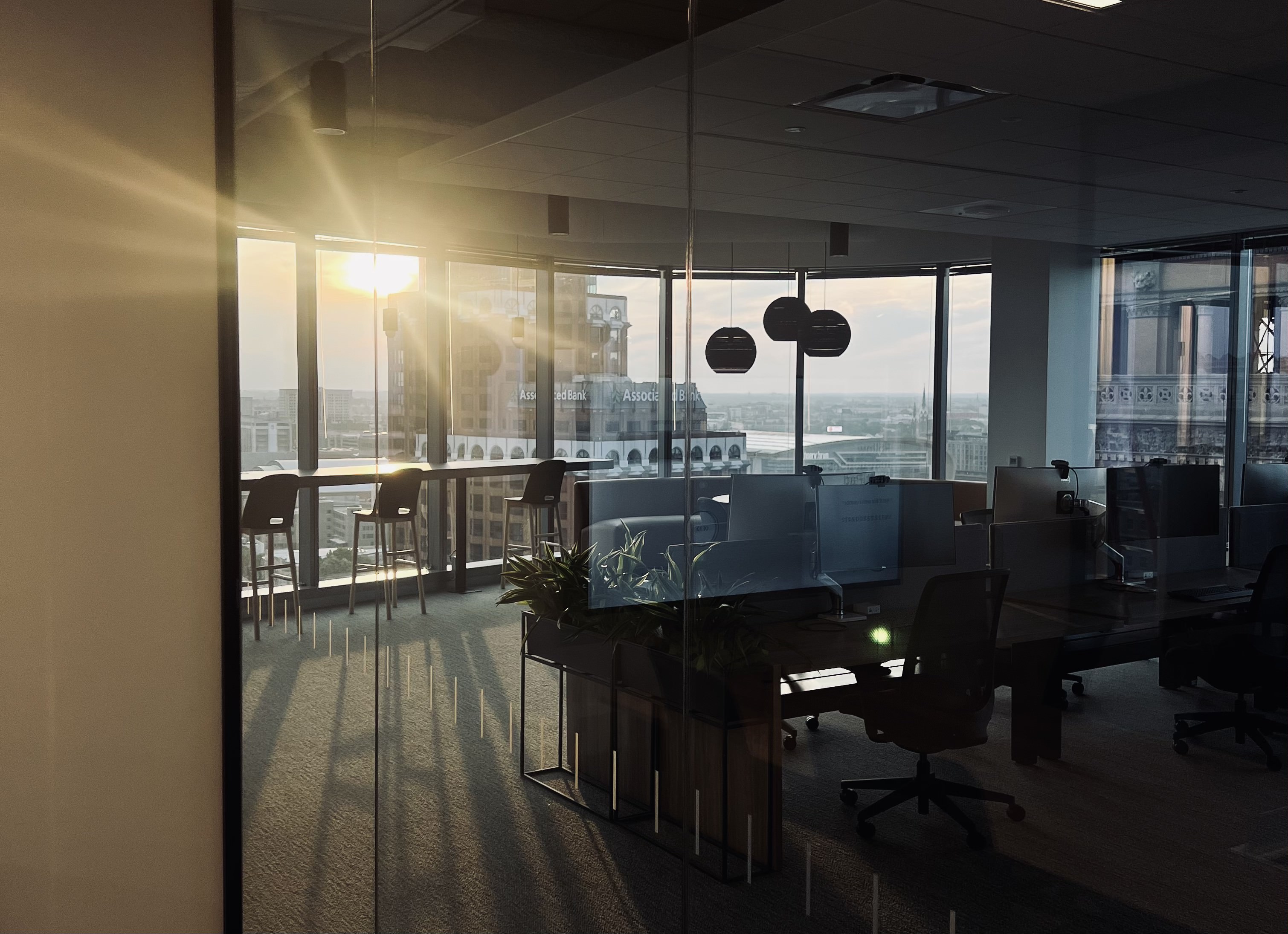 Glass partition cleaning at a downtown Milwaukee office building